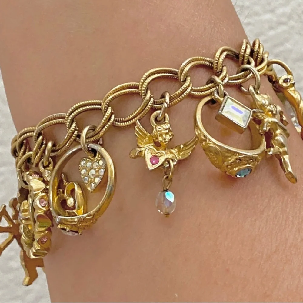 Kirks Folly charm bracelet crystal gold rings hearts cherubs dangles -Bnwot - Picture 1 of 15